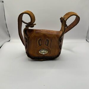Leather bag small  great preowned condition 4”wider 4”length brown